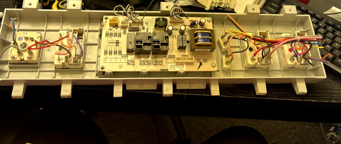 AGM72925401 USED PANEL WITH 4 KNOBS AND EBR60969201 CONTROL BOARD SCM523